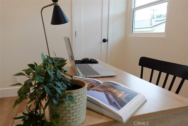home office featuring wood finished floors