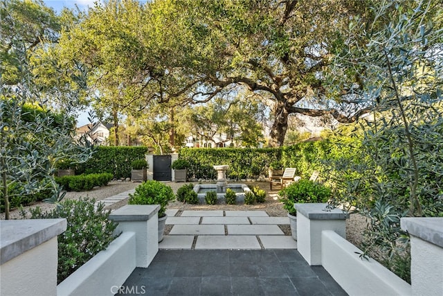 view of patio / terrace featuring fence