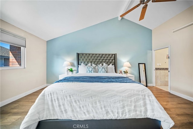 bedroom with vaulted ceiling with beams, baseboards, and wood finished floors