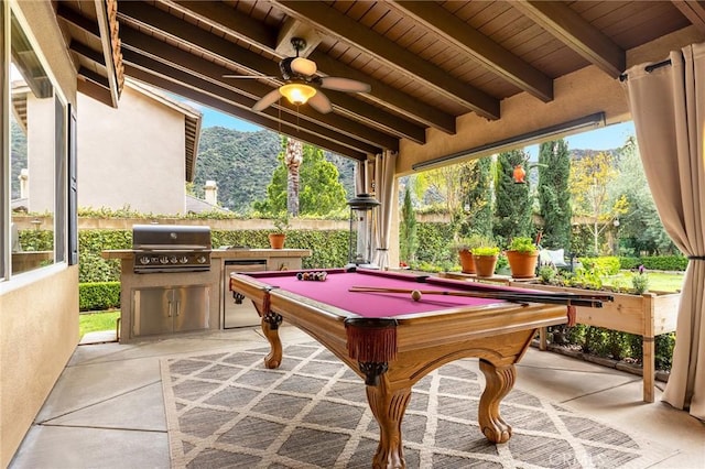 rec room featuring billiards, a ceiling fan, vaulted ceiling with beams, concrete flooring, and wooden ceiling