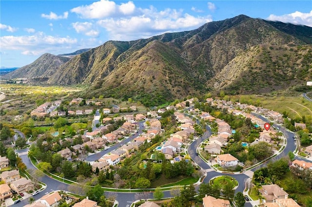 bird's eye view with a residential view and a mountain view