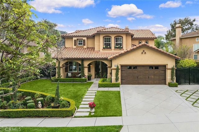 mediterranean / spanish-style house with a front lawn, a tile roof, stucco siding, driveway, and a gate