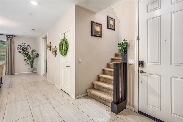 1007 Violet Ct, Calimesa, CA 92320 - foyer entrance with stairway and baseboards
