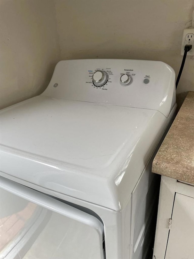 washroom featuring washer / dryer