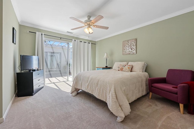 carpeted bedroom featuring a ceiling fan, visible vents, baseboards, access to exterior, and crown molding