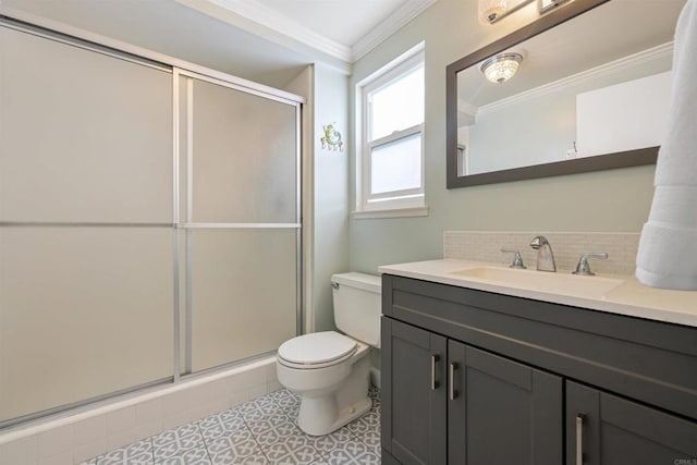 bathroom with a shower stall, backsplash, toilet, and crown molding