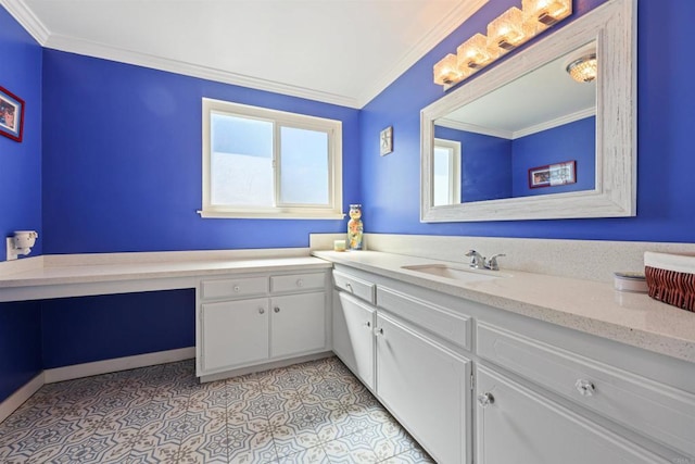 bathroom with tile patterned floors, baseboards, ornamental molding, and vanity