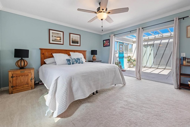 bedroom featuring ceiling fan, access to exterior, carpet floors, and ornamental molding