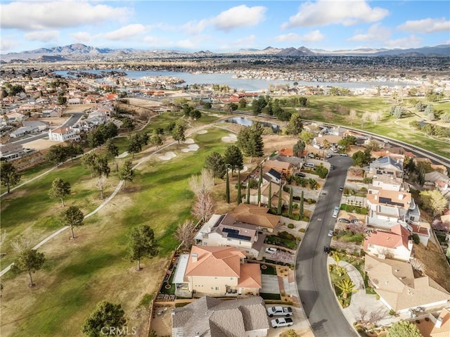 birds eye view of property with a residential view and a water and mountain view