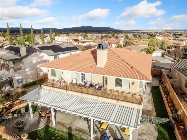 bird's eye view with a residential view and a mountain view