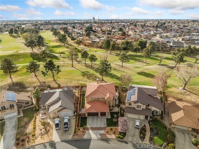 aerial view featuring golf course view and a residential view