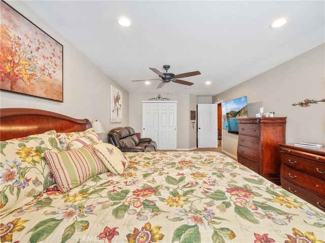 bedroom with a closet, recessed lighting, and a ceiling fan