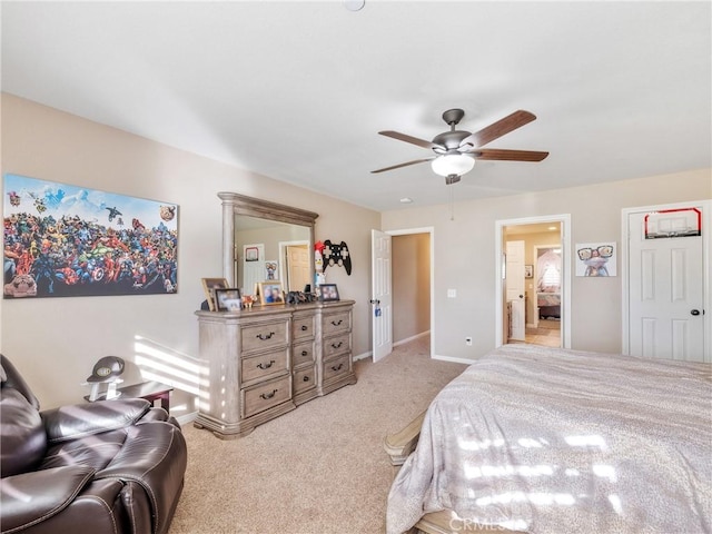 bedroom featuring a ceiling fan, carpet, and baseboards