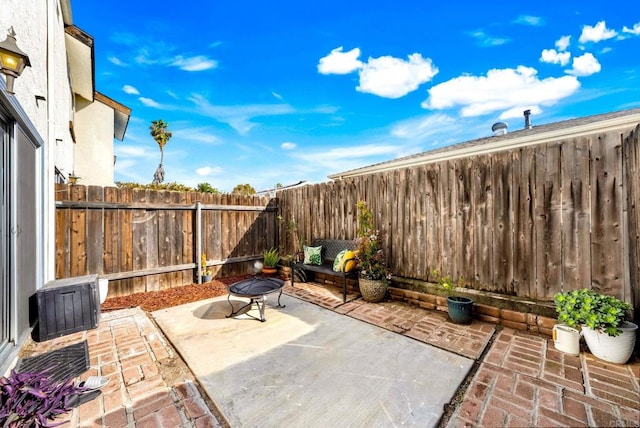 view of patio with a fenced backyard