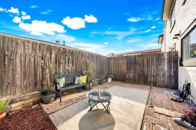 view of patio featuring a fenced backyard