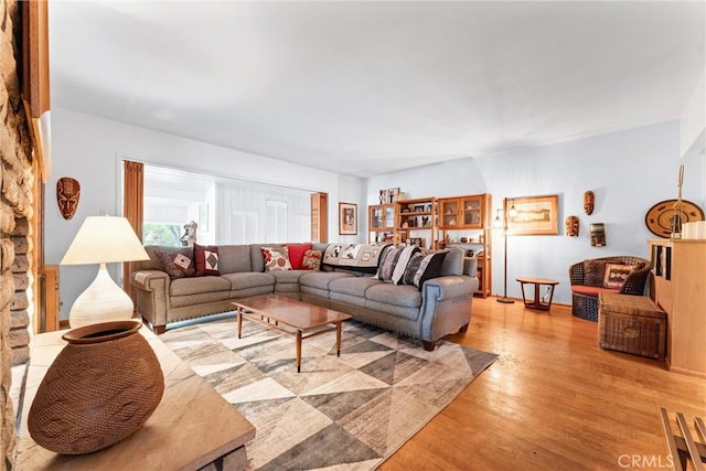 living area with light wood-style floors