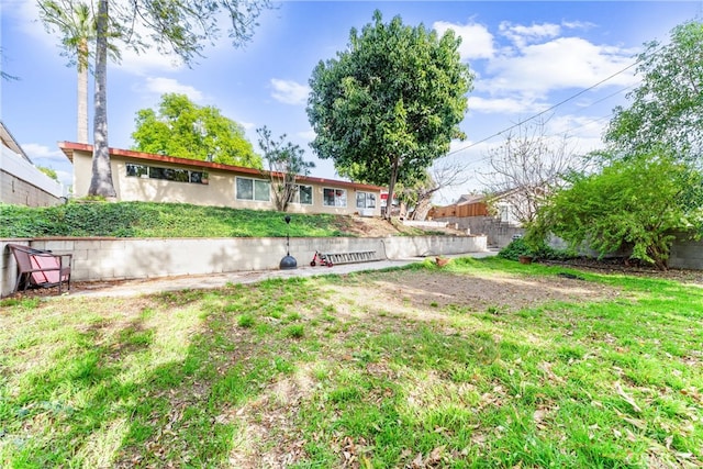 view of yard featuring fence