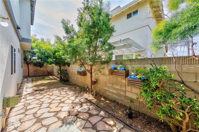 view of patio featuring a fenced backyard