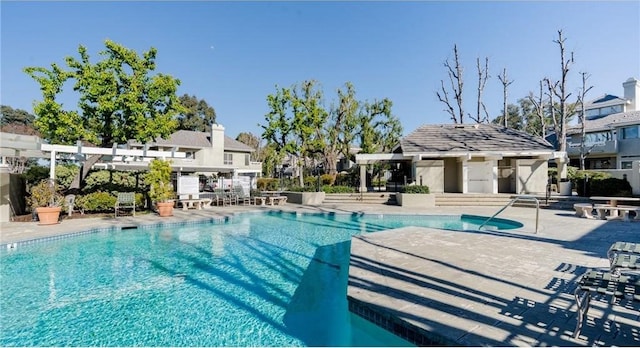 community pool featuring a patio