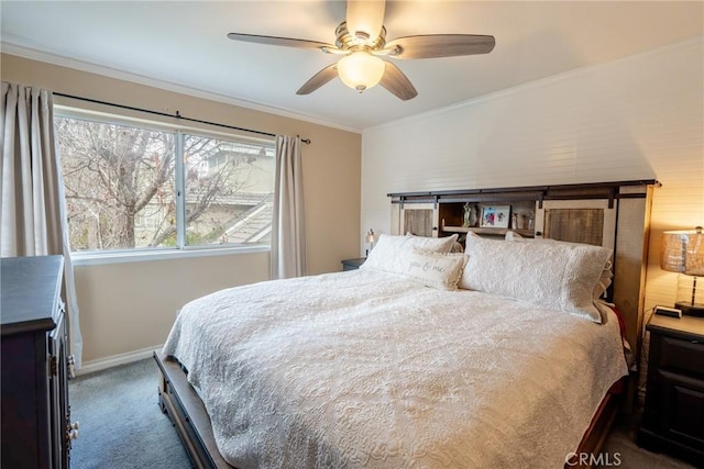 bedroom featuring crown molding, a ceiling fan, baseboards, and carpet floors