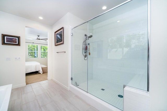 bathroom featuring baseboards, recessed lighting, ceiling fan, a shower stall, and ensuite bathroom