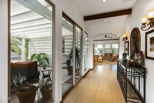 interior space featuring tile patterned floors, visible vents, beam ceiling, and recessed lighting