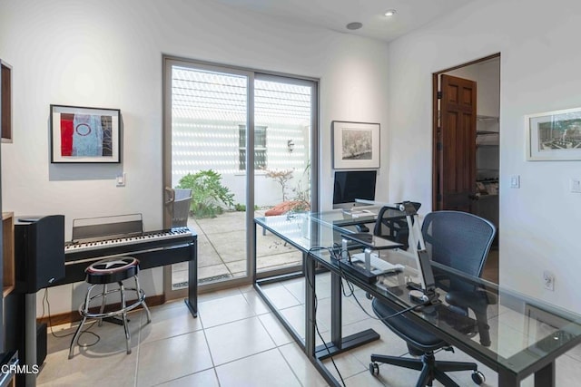 home office featuring light tile patterned flooring