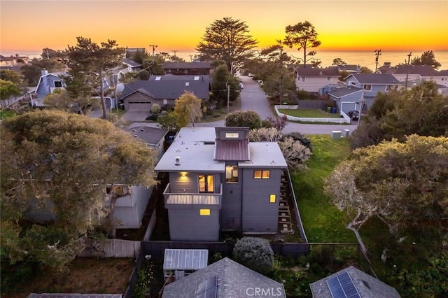 aerial view at dusk with a residential view