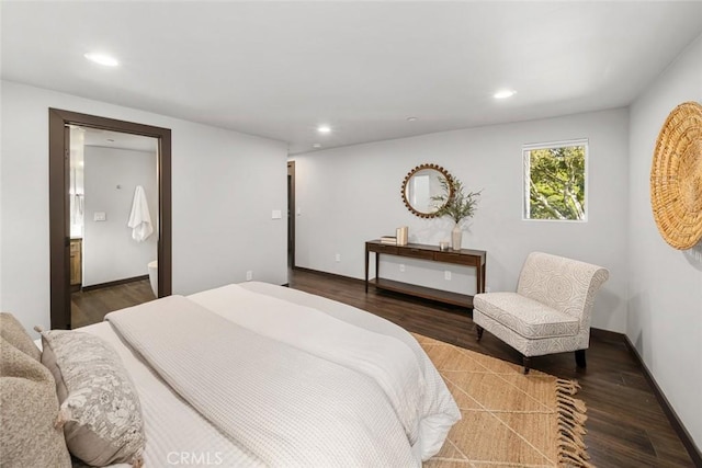 bedroom featuring recessed lighting and wood finished floors