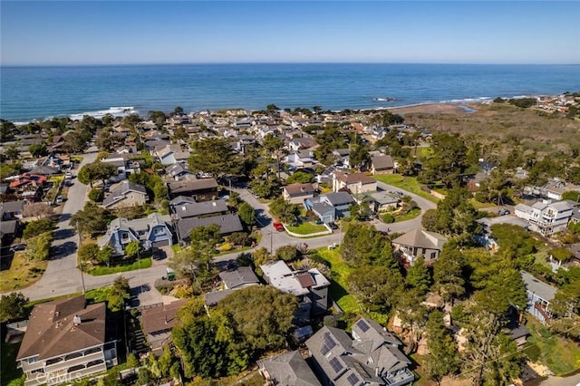 birds eye view of property featuring a residential view and a water view