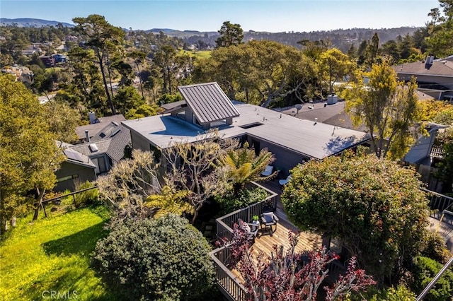 birds eye view of property featuring a mountain view