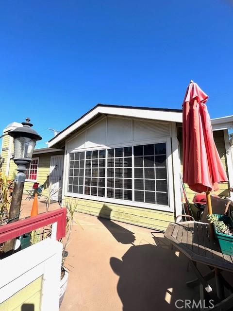 rear view of property with a patio
