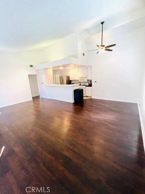 1864 Raymond Ave Unit 4, Signal Hill, CA 90755 - unfurnished living room with a ceiling fan, baseboards, dark wood finished floors, and high vaulted ceiling