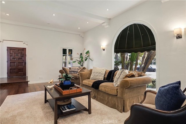 living area featuring recessed lighting, wood finished floors, and baseboards