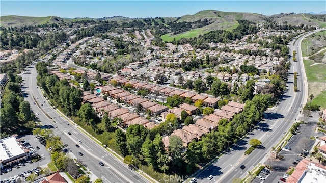 aerial view with a mountain view and a residential view