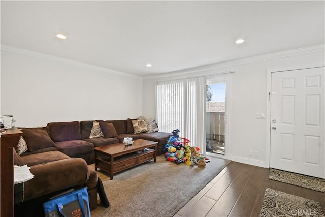 living area with recessed lighting, baseboards, wood finished floors, and crown molding