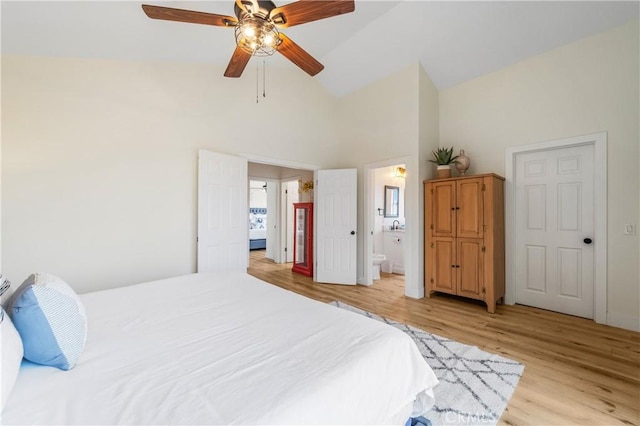 38680 Mesa Rd, Temecula, CA 92592 - bedroom with light wood-type flooring, high vaulted ceiling, ensuite bathroom, and ceiling fan