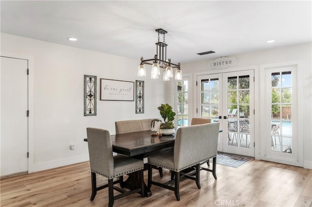 38680 Mesa Rd, Temecula, CA 92592 - dining space with french doors, light wood-style floors, recessed lighting, and baseboards