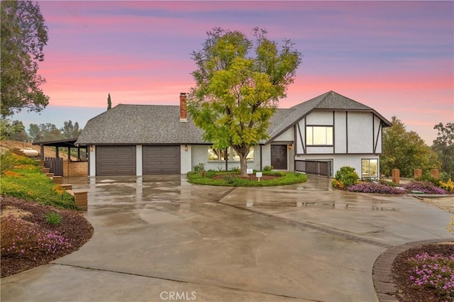 38680 Mesa Rd, Temecula, CA 92592 - view of front of property with concrete driveway, a garage, a chimney, and a shingled roof