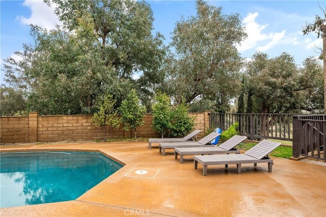 38680 Mesa Rd, Temecula, CA 92592 - view of swimming pool featuring a fenced backyard and a patio