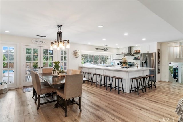 38680 Mesa Rd, Temecula, CA 92592 - dining space featuring light wood-style floors, recessed lighting, french doors, and a chandelier