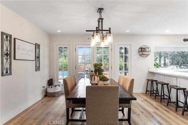 38680 Mesa Rd, Temecula, CA 92592 - dining area featuring plenty of natural light, light wood finished floors, a chandelier, and recessed lighting