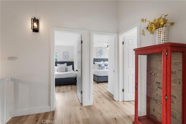 38680 Mesa Rd, Temecula, CA 92592 - corridor with light wood-type flooring and baseboards