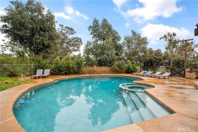 38680 Mesa Rd, Temecula, CA 92592 - view of pool with a pool with connected hot tub, a fenced backyard, a patio area, and view of wooded area