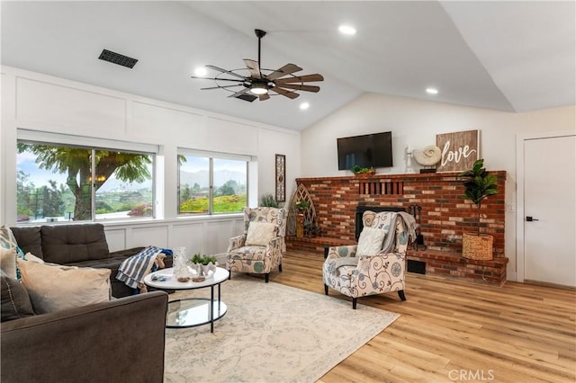 38680 Mesa Rd, Temecula, CA 92592 - living area featuring a ceiling fan, lofted ceiling, light wood-type flooring, recessed lighting, and a fireplace