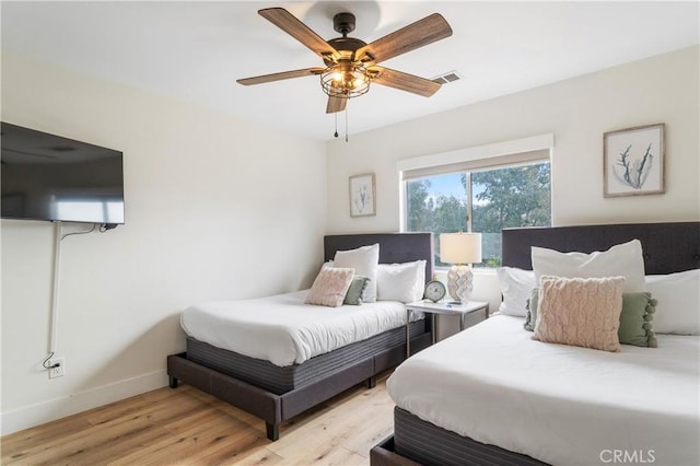 38680 Mesa Rd, Temecula, CA 92592 - bedroom featuring light wood-style flooring, baseboards, and a ceiling fan