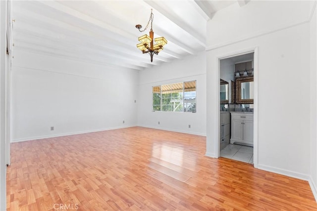 unfurnished living room with beamed ceiling, a notable chandelier, light wood-style flooring, and baseboards