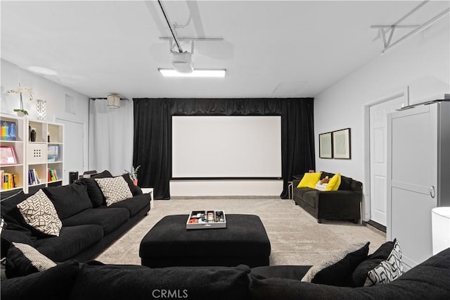 carpeted cinema featuring a garage