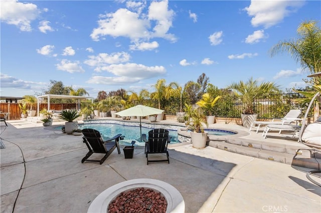 view of swimming pool featuring a fenced in pool, a patio area, fence, and a hot tub