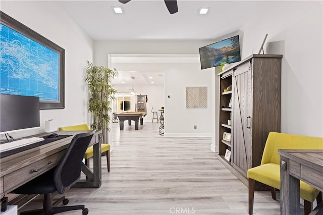 office with pool table, baseboards, light wood finished floors, and ceiling fan